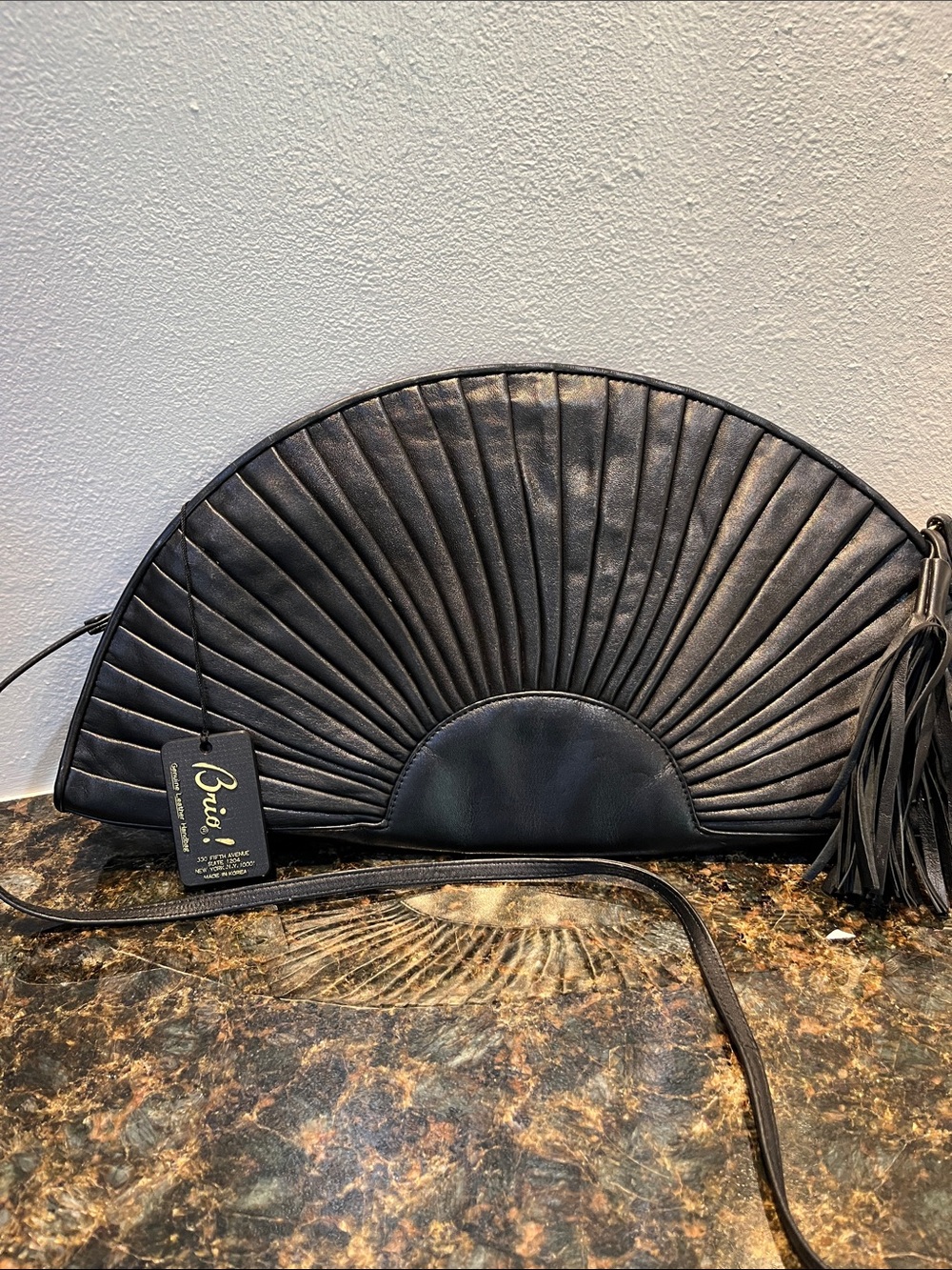 Black Fan-Quilted Half-Moon Shoulder Bag with Tassel